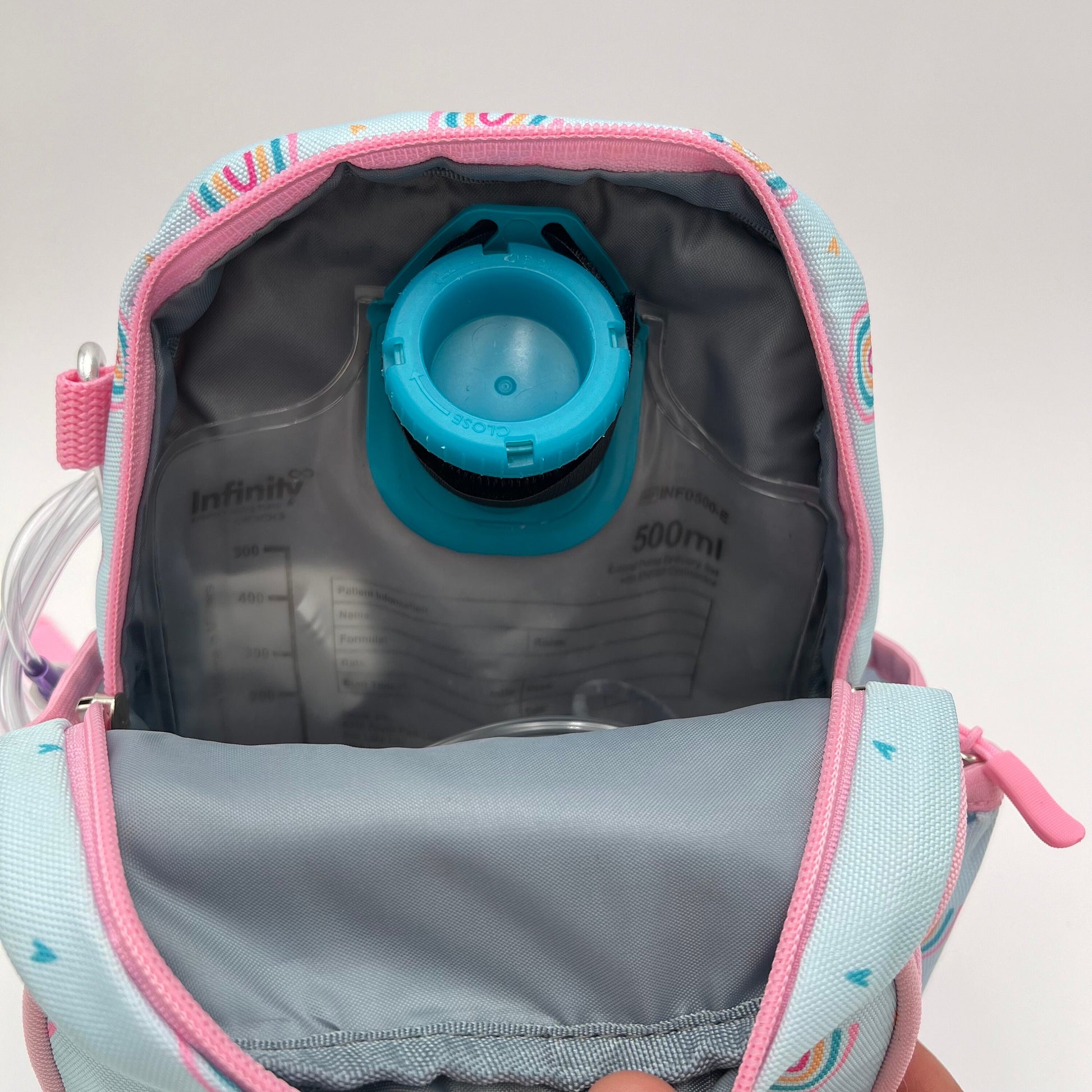 Infant Sized Tube Feeding Backpack with Leash | 500ML | for EnteraLite Infinity Pump | XS 9.5” | Blue and Pink Rainbows