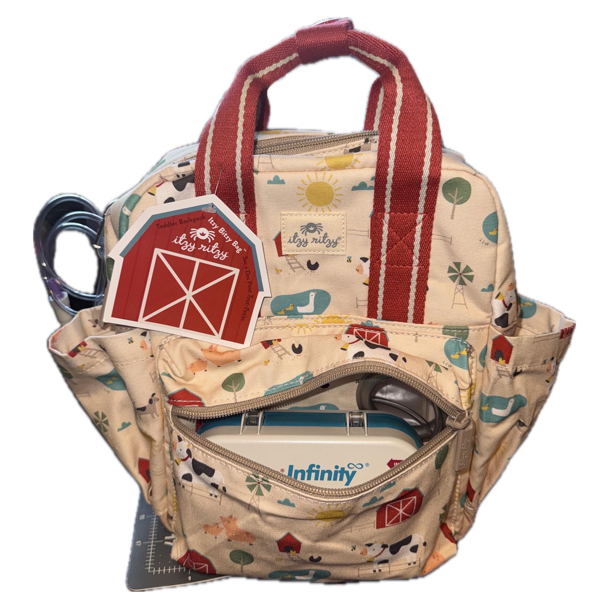 infinity mini backpack Mion Backpack holds EnteraLite Infinity feeding pump with a 500 mL bag in the front section Toddler Sized Tube Feeding Backpack